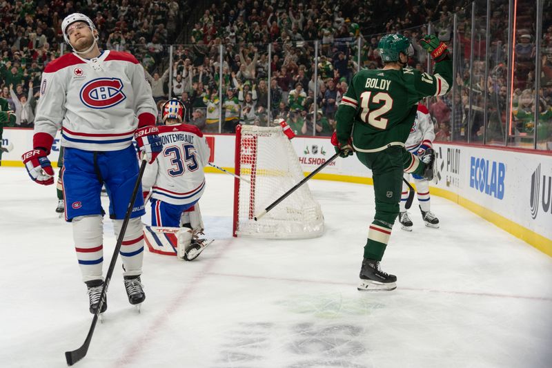 Dec 21, 2023; Saint Paul, Minnesota, USA; Minnesota Wild left wing Matt Boldy (12) celebrates a goal against the Montreal Canadiens in the first period at Xcel Energy Center. Mandatory Credit: Matt Blewett-USA TODAY Sports