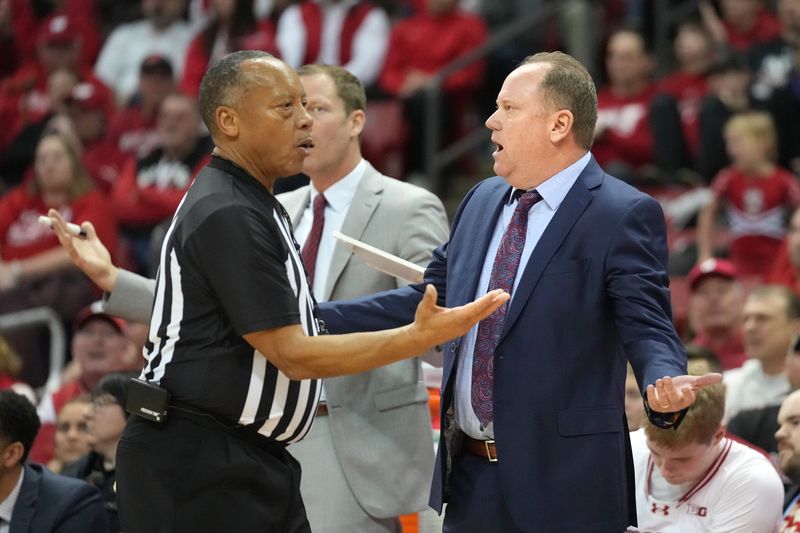 Jan 13, 2024; Madison, Wisconsin, USA; Wisconsin Badgers head coach Greg Gard reacts to a foul call during the first half against the Northwestern Wildcats at the Kohl Center. Mandatory Credit: Kayla Wolf-USA TODAY Sports