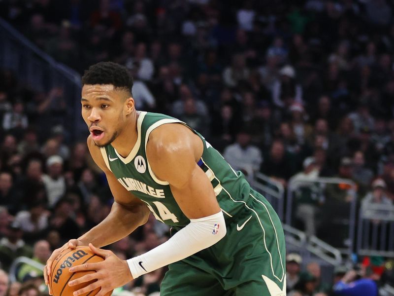 MILWAUKEE, WISCONSIN - DECEMBER 21: Giannis Antetokounmpo #34 of the Milwaukee Bucks handles the ball during a game against the Orlando Magic at Fiserv Forum on December 21, 2023 in Milwaukee, Wisconsin. NOTE TO USER: User expressly acknowledges and agrees that, by downloading and or using this photograph, User is consenting to the terms and conditions of the Getty Images License Agreement. (Photo by Stacy Revere/Getty Images)