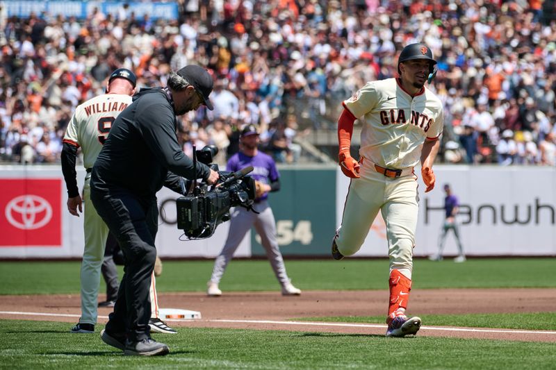 May 4, 2025; San Francisco, California, USA; San Francisco Giants shortstop Willy Adames (2) runs toward home plate after hitting a one run home run against the Colorado Rockies during the first inning at Oracle Park. Mandatory Credit: Robert Edwards-Imagn Images