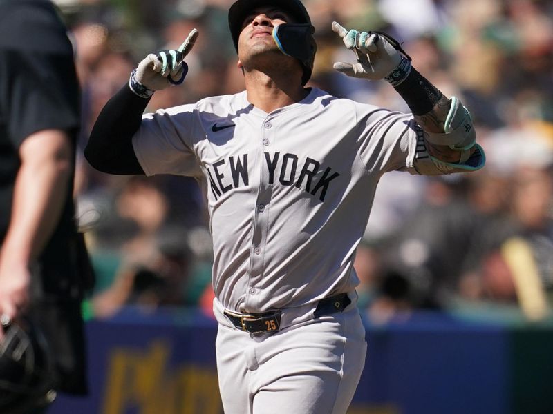 Sep 22, 2024; Oakland, California, USA; New York Yankees second baseman Gleyber Torres (25) celebrates after hitting a home run against the Oakland Athletics in the fifth inning at the Oakland-Alameda County Coliseum. Mandatory Credit: Cary Edmondson-Imagn Images