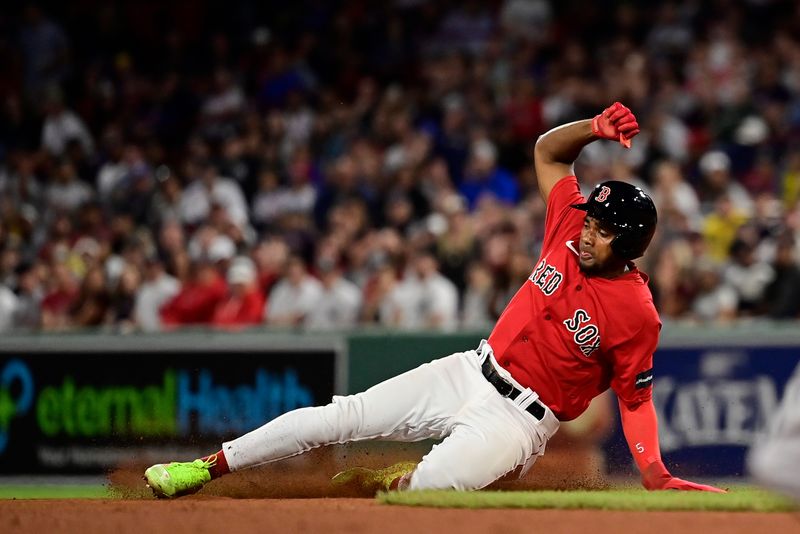 Sep 14, 2023; Boston, Massachusetts, USA; Boston Red Sox second baseman Pablo Reyes (19) slides into second base during the sixth inning against the New York Yankees at Fenway Park. Mandatory Credit: Eric Canha-USA TODAY Sports