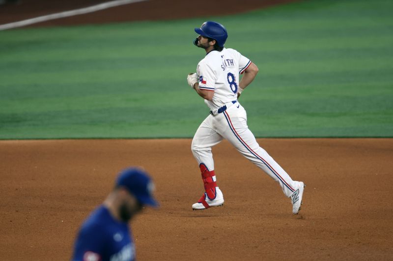 Jun 22, 2024; Arlington, Texas, USA; Texas Rangers third base Josh Smith (8) rounds the bases after hitting a solo home run in the fourth inning against the Kansas City Royals at Globe Life Field. Mandatory Credit: Tim Heitman-USA TODAY Sports