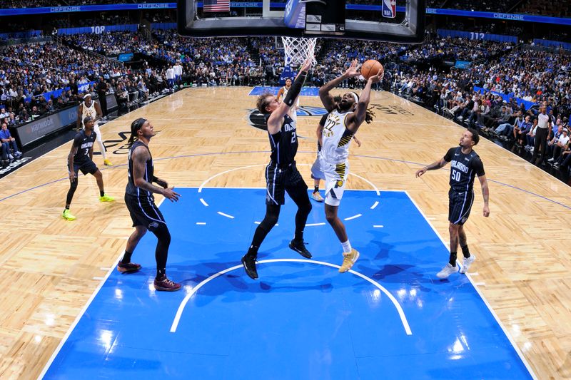 ORLANDO, FL - OCTOBER 28: Isaiah Jackson #22 of the Indiana Pacers drives to the basket during the game against the Orlando Magic on October 28, 2024 at Kia Center in Orlando, Florida. NOTE TO USER: User expressly acknowledges and agrees that, by downloading and or using this photograph, User is consenting to the terms and conditions of the Getty Images License Agreement. Mandatory Copyright Notice: Copyright 2024 NBAE (Photo by Fernando Medina/NBAE via Getty Images)