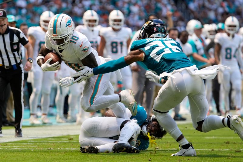 Miami Dolphins Edge Out Jacksonville Jaguars in Season Kickoff