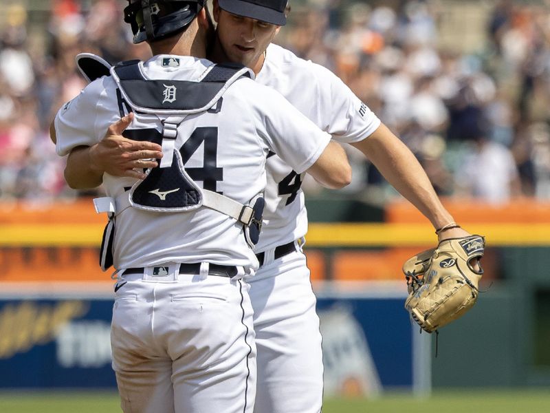 Aug 5, 2023; Detroit, Michigan, USA; Detroit Tigers relief pitcher Beau Brieske (4) celebrates the victory over the Tampa Bay Rays with catcher Jake Rogers (34) at Comerica Park. Mandatory Credit: David Reginek-USA TODAY Sports