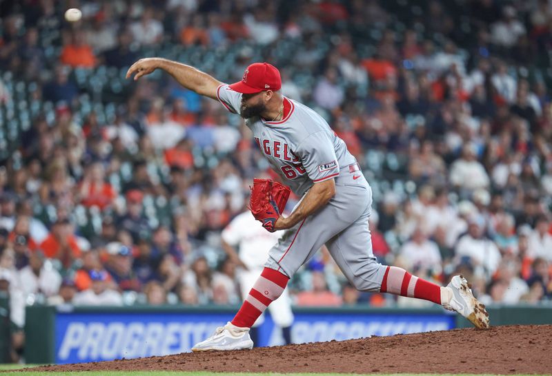 May 22, 2024; Houston, Texas, USA; Los Angeles Angels relief pitcher Luis Garcia (66) delivers a pitch during the ninth inning against the Houston Astros at Minute Maid Park. Mandatory Credit: Troy Taormina-USA TODAY Sports