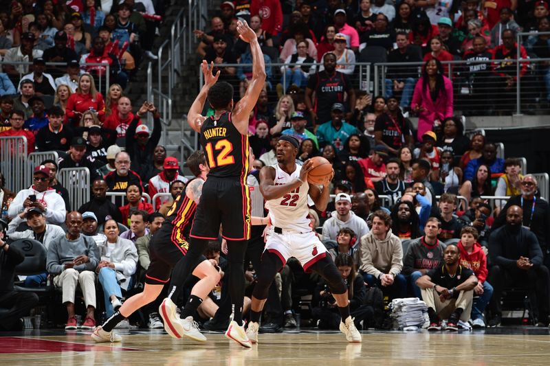 ATLANTA, GA - APRIL 9: Jimmy Butler #22 of the Miami Heat handles the ball during the game against the Atlanta Hawks on April 9, 2024 at State Farm Arena in Atlanta, Georgia.  NOTE TO USER: User expressly acknowledges and agrees that, by downloading and/or using this Photograph, user is consenting to the terms and conditions of the Getty Images License Agreement. Mandatory Copyright Notice: Copyright 2024 NBAE (Photo by Scott Cunningham/NBAE via Getty Images)