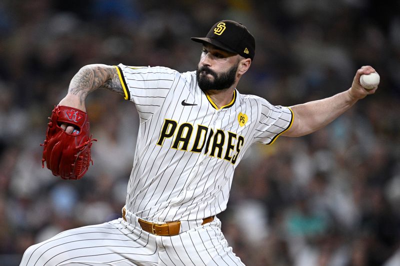 Aug 20, 2024; San Diego, California, USA; San Diego Padres relief pitcher Tanner Scott (66) pitches against the Minnesota Twins during the eighth inning at Petco Park. Mandatory Credit: Orlando Ramirez-USA TODAY Sports