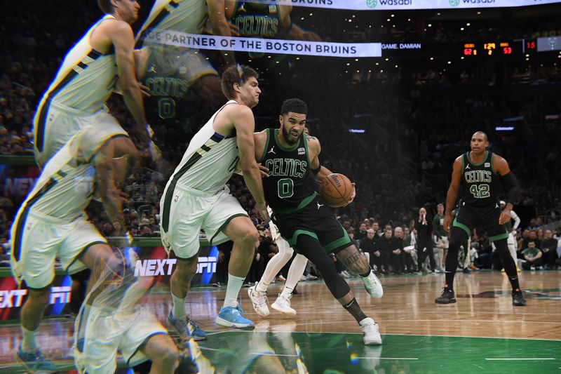 BOSTON, MA - MARCH 20 (EDITORS NOTE: This image was captured using a kaleidoscope filter): Jayson Tatum #0 of the Boston Celtics handles the ball during the game against the Milwaukee Bucks on March 20, 2024 at the TD Garden in Boston, Massachusetts. NOTE TO USER: User expressly acknowledges and agrees that, by downloading and or using this photograph, User is consenting to the terms and conditions of the Getty Images License Agreement. Mandatory Copyright Notice: Copyright 2024 NBAE  (Photo by Brian Babineau/NBAE via Getty Images)