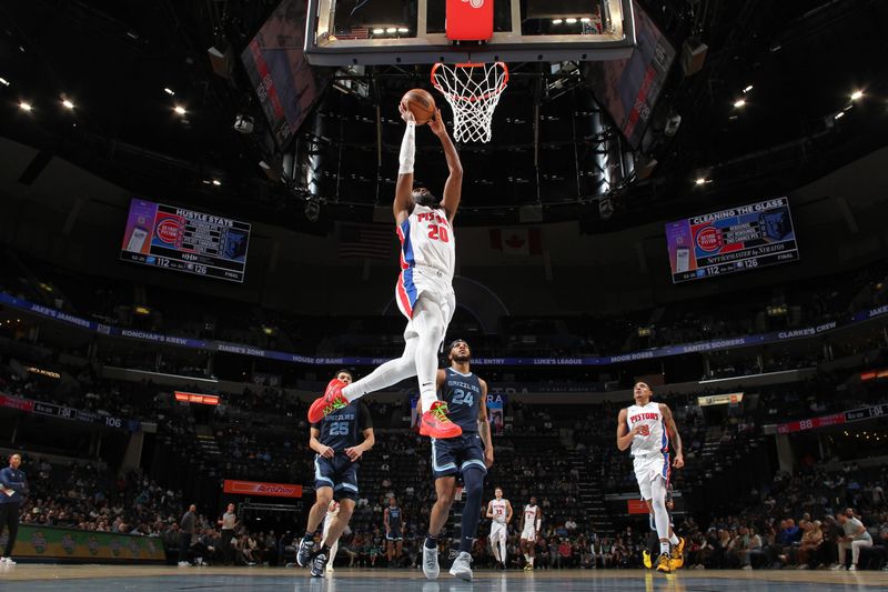 MEMPHIS, TN - APRIL 5: Jaylen Nowell #20 of the Detroit Pistons dunks the ball during the game against the Memphis Grizzlies on April 5, 2024 at FedExForum in Memphis, Tennessee. NOTE TO USER: User expressly acknowledges and agrees that, by downloading and or using this photograph, User is consenting to the terms and conditions of the Getty Images License Agreement. Mandatory Copyright Notice: Copyright 2024 NBAE (Photo by Joe Murphy/NBAE via Getty Images)