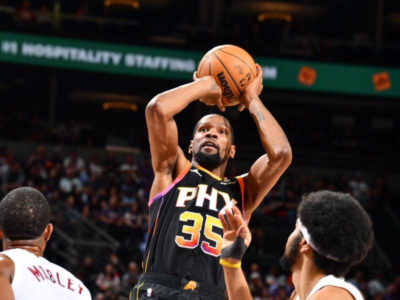 PHOENIX, AZ - APRIL 3:  Kevin Durant #35 of the Phoenix Suns shoots the ball during the game  on April 3, 2024 at Footprint Center in Phoenix, Arizona. NOTE TO USER: User expressly acknowledges and agrees that, by downloading and or using this photograph, user is consenting to the terms and conditions of the Getty Images License Agreement. Mandatory Copyright Notice: Copyright 2024 NBAE (Photo by Barry Gossage/NBAE via Getty Images)