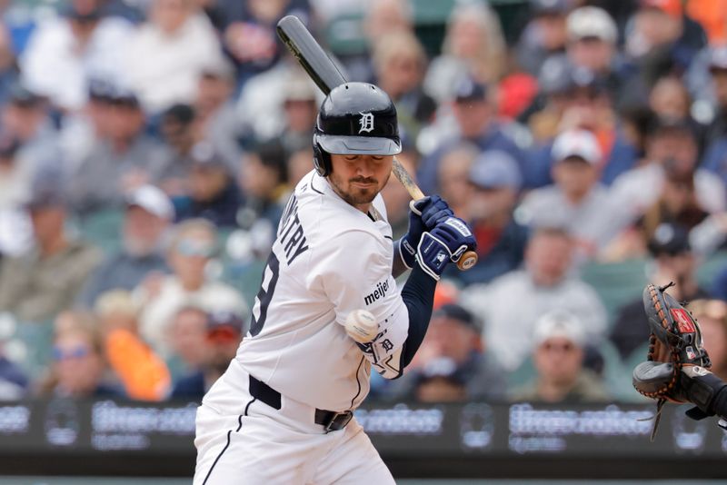 May 28, 2025; Detroit, Michigan, USA;  Detroit Tigers outfielder Zach McKinstry (39) is hit by a pitch in the fourth inning against the San Francisco Giants at Comerica Park. Mandatory Credit: Rick Osentoski-Imagn Images