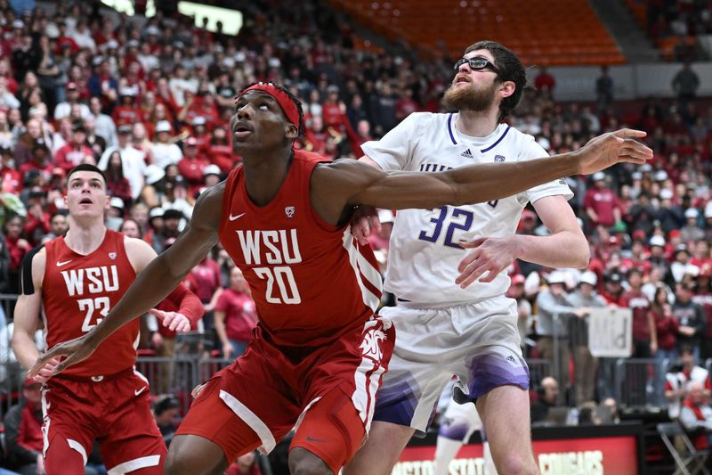 Mar 7, 2024; Pullman, Washington, USA; Washington State Cougars center Rueben Chinyelu (20) fights for position against Washington Huskies forward Wilhelm Breidenbach (32) in the first half at Friel Court at Beasley Coliseum. Mandatory Credit: James Snook-USA TODAY Sports