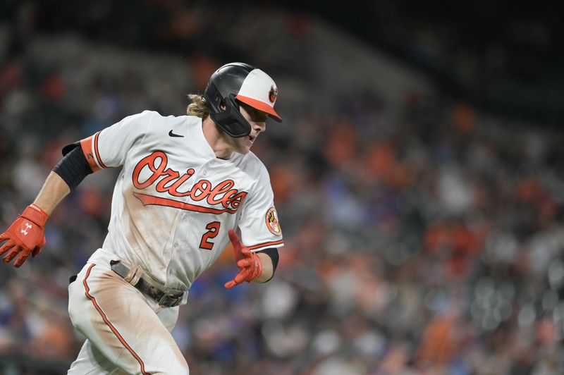 Aug 23, 2023; Baltimore, Maryland, USA;  Baltimore Orioles shortstop  Gunnar Henderson (2) runs out a third inning double against the Toronto Blue Jays at Oriole Park at Camden Yards. Mandatory Credit: Tommy Gilligan-USA TODAY Sports