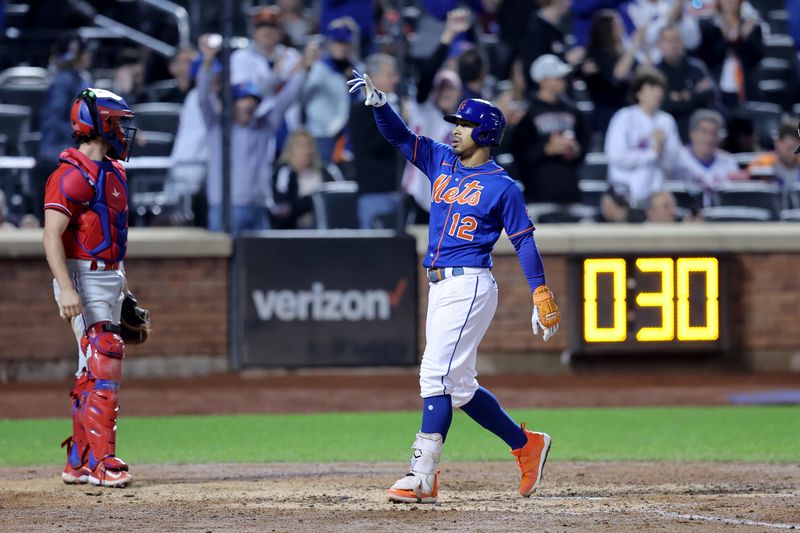 Sep 30, 2023; New York City, New York, USA; New York Mets shortstop Francisco Lindor (12) celebrates his two run home run against the Philadelphia Phillies during the fourth inning at Citi Field. Mandatory Credit: Brad Penner-USA TODAY Sports