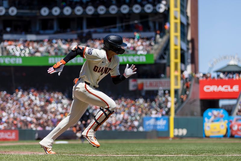 Apr 28, 2024; San Francisco, California, USA;  San Francisco Giants center fielder Jung Hoo Lee (51) runs after hitting a single against the Pittsburgh Pirates during the third inning at Oracle Park. Mandatory Credit: John Hefti-USA TODAY Sports