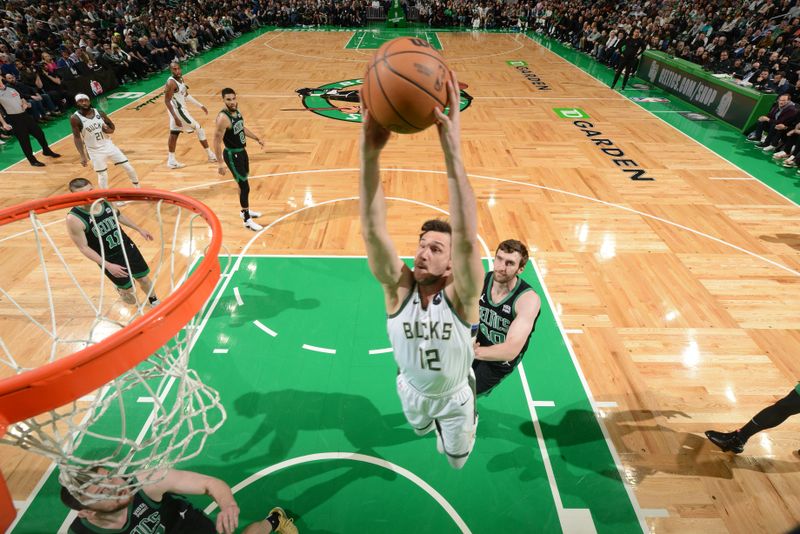 BOSTON, MA - MARCH 20: Danilo Gallinari #12 of the Milwaukee Bucks drives to the basket during the game against the Boston Celtics on March 20, 2024 at the TD Garden in Boston, Massachusetts. NOTE TO USER: User expressly acknowledges and agrees that, by downloading and or using this photograph, User is consenting to the terms and conditions of the Getty Images License Agreement. Mandatory Copyright Notice: Copyright 2024 NBAE  (Photo by Brian Babineau/NBAE via Getty Images)