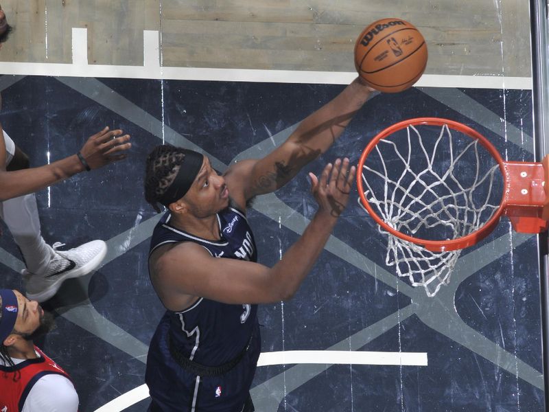 ORLANDO, FL - MARCH 21: Wendell Carter Jr. #34 of the Orlando Magic drives to the basket during the game against the New Orleans Pelicans on March 21, 2024 at Amway Center in Orlando, Florida. NOTE TO USER: User expressly acknowledges and agrees that, by downloading and or using this photograph, User is consenting to the terms and conditions of the Getty Images License Agreement. Mandatory Copyright Notice: Copyright 2024 NBAE (Photo by Fernando Medina/NBAE via Getty Images)