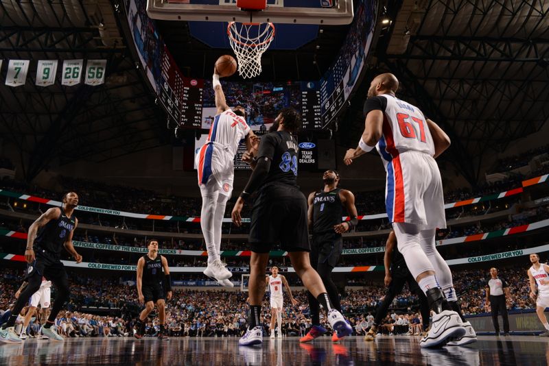 DALLAS, TX - APRIL 12: Troy Brown Jr. #7 of the Detroit Pistons dunks the ball during the game against the Dallas Mavericks on April 12, 2024 at the American Airlines Center in Dallas, Texas. NOTE TO USER: User expressly acknowledges and agrees that, by downloading and or using this photograph, User is consenting to the terms and conditions of the Getty Images License Agreement. Mandatory Copyright Notice: Copyright 2024 NBAE (Photo by Glenn James/NBAE via Getty Images)