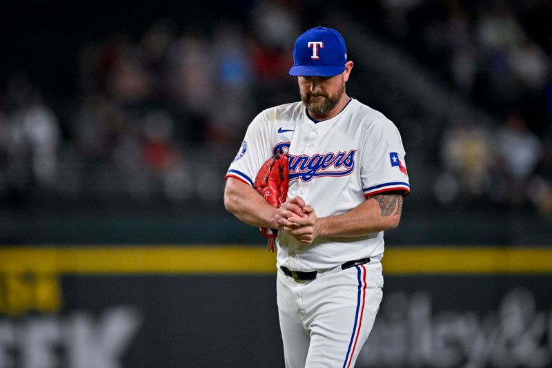 Sep 5, 2024; Arlington, Texas, USA; Texas Rangers relief pitcher Kirby Yates (39) pitches against the Los Angeles Angels during the game at Globe Life Field. Mandatory Credit: Jerome Miron-Imagn Images