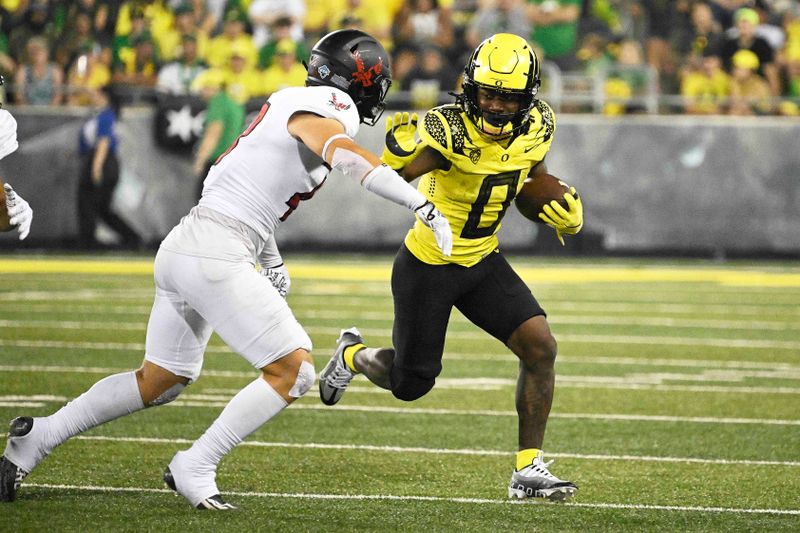 Sep 10, 2022; Eugene, Oregon, USA; Oregon Ducks running back Mar'Keise Irving (0) picks up yardage during the second half against the Eastern Washington Eagles at Autzen Stadium. Mandatory Credit: Troy Wayrynen-USA TODAY Sports