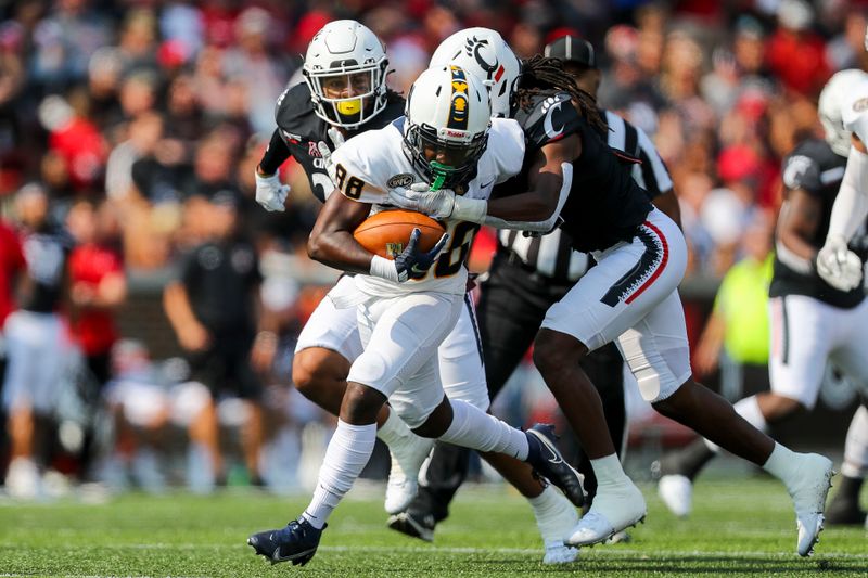 Sep 11, 2021; Cincinnati, Ohio, USA; Murray State Racers wide receiver Deshun Britten (88) runs with the ball past Cincinnati Bearcats cornerback Arquon Bush (9) in the first half at Nippert Stadium. Mandatory Credit: Katie Stratman-USA TODAY Sports