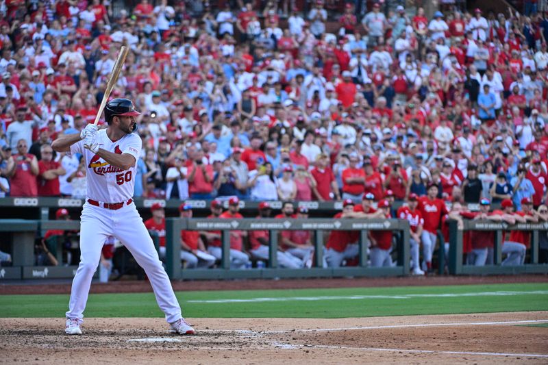 Oct 1, 2023; St. Louis, Missouri, USA;  St. Louis Cardinals pinch hitter Adam Wainwright (50) bats in his final at bat during the eighth inning against the Cincinnati Reds at Busch Stadium. Mandatory Credit: Jeff Curry-USA TODAY Sports