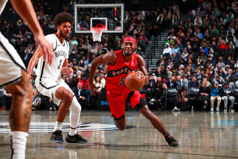 BROOKLYN, NY - OCTOBER 18: Immanuel Quickley #5 of the Toronto Raptors dribbles the ball during the game on October 18, 2024 at Barclays Center in Brooklyn, New York. NOTE TO USER: User expressly acknowledges and agrees that, by downloading and or using this Photograph, user is consenting to the terms and conditions of the Getty Images License Agreement. Mandatory Copyright Notice: Copyright 2024 NBAE (Photo by David L. Nemec/NBAE via Getty Images)