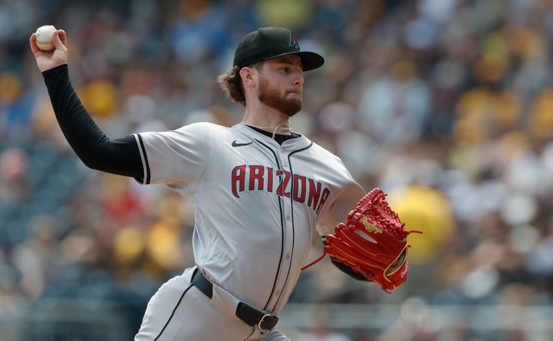 Aug 4, 2024; Pittsburgh, Pennsylvania, USA;  Arizona Diamondbacks starting pitcher Ryne Nelson (19) delivers a pitch against the Pittsburgh Pirates/ during the first inning at PNC Park. Mandatory Credit: Charles LeClaire-USA TODAY Sports