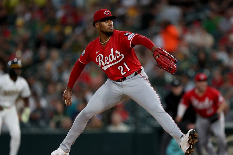 Sep 13, 2025; West Sacramento, California, USA; Cincinnati Reds starting pitcher Hunter Greene (21) throws a pitch against the Athletics during the first inning at Sutter Health Park. Mandatory Credit: Dennis Lee-Imagn Images