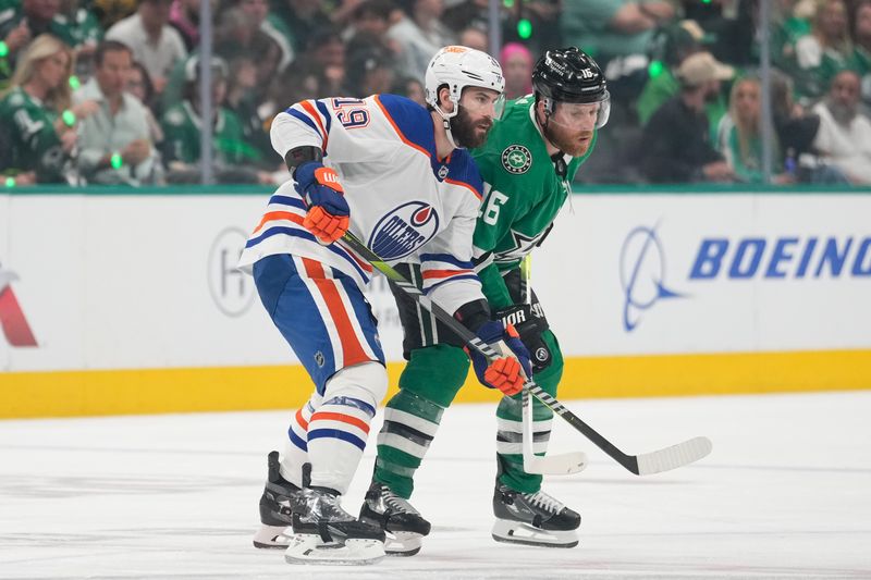 May 31, 2024; Dallas, Texas, USA; Edmonton Oilers center Adam Henrique (19) an Dallas Stars center Joe Pavelski (16) in action during the second period between the Dallas Stars and the Edmonton Oilers in game five of the Western Conference Final of the 2024 Stanley Cup Playoffs at American Airlines Center. Mandatory Credit: Chris Jones-USA TODAY Sports
