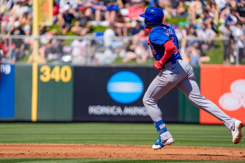 Mar 16, 2024; Tempe, Arizona, USA; Chicago Cubs infielder Christopher Morel (5) rounds the bases in the third after a home run during a spring training game against the Los Angeles Angels at Tempe Diablo Stadium. Mandatory Credit: Allan Henry-USA TODAY Sports