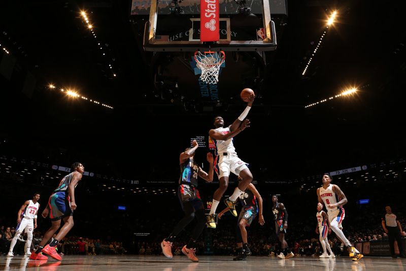 BROOKLYN, NY - APRIL 6: Chimezie Metu #5 of the Detroit Pistons drives to the basket during the game against the Brooklyn Nets on April 6, 2024 at Barclays Center in Brooklyn, New York. NOTE TO USER: User expressly acknowledges and agrees that, by downloading and or using this Photograph, user is consenting to the terms and conditions of the Getty Images License Agreement. Mandatory Copyright Notice: Copyright 2024 NBAE (Photo by Nathaniel S. Butler/NBAE via Getty Images)