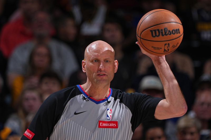 DENVER, CO - MARCH 31: Referee Eric Dalen #37 looks on during the game between the Cleveland Cavaliers and the Denver Nuggets on March 31, 2024 at the Ball Arena in Denver, Colorado. NOTE TO USER: User expressly acknowledges and agrees that, by downloading and/or using this Photograph, user is consenting to the terms and conditions of the Getty Images License Agreement. Mandatory Copyright Notice: Copyright 2024 NBAE (Photo by Garrett Ellwood/NBAE via Getty Images)