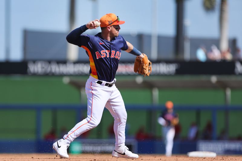 Feb 25, 2024; West Palm Beach, Florida, USA; Houston Astros third baseman Alex Bregman (2) throws to first base against the St. Louis Cardinals during the fourth inning at CACTI Park of the Palm Beaches. Mandatory Credit: Sam Navarro-USA TODAY Sports