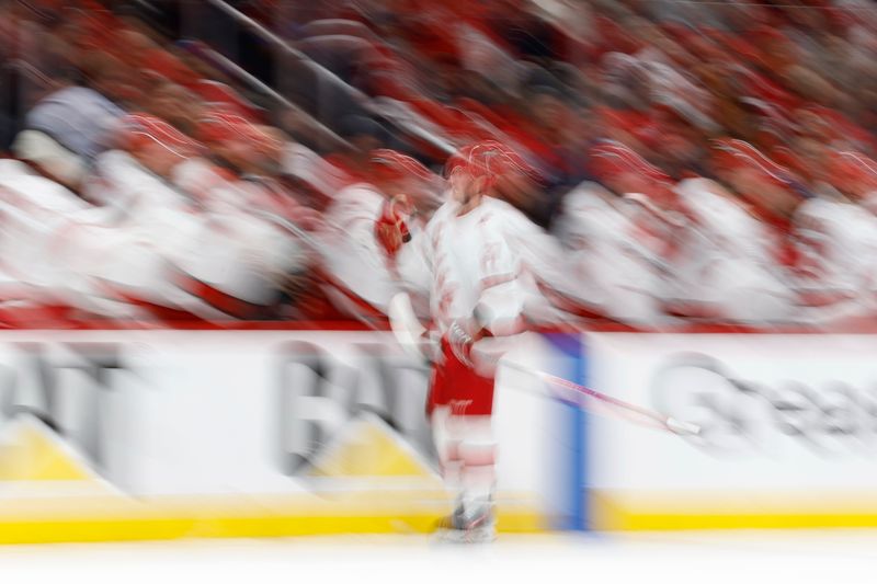 May 15, 2025; Washington, District of Columbia, USA; Carolina Hurricanes right wing Andrei Svechnikov (37) celebrates with teammates after scoring the go ahead goal against the Washington Capitals late in the third period in game five of the second round of the 2025 Stanley Cup Playoffs at Capital One Arena. Mandatory Credit: Geoff Burke-Imagn Images
