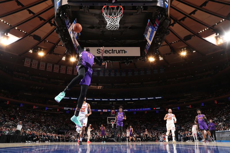 NEW YORK, NY - JANUARY 8:  Chris Boucher #25 of the Toronto Raptors dunks the ball during the game against the New York Knicks  on January 8, 2025 at Madison Square Garden in New York City, New York.  NOTE TO USER: User expressly acknowledges and agrees that, by downloading and or using this photograph, User is consenting to the terms and conditions of the Getty Images License Agreement. Mandatory Copyright Notice: Copyright 2024 NBAE  (Photo by Nathaniel S. Butler/NBAE via Getty Images)