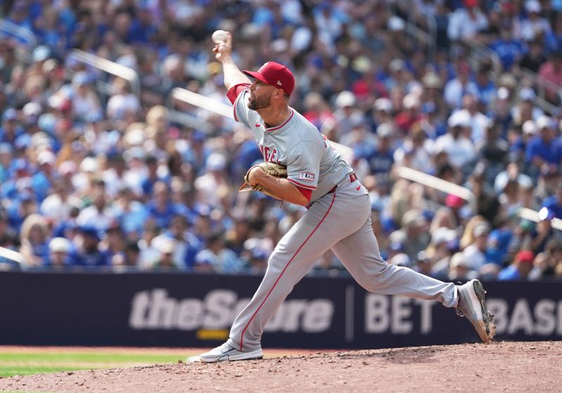 Aug 25, 2024; Toronto, Ontario, CAN; Los Angeles Angels relief pitcher Hunter Strickland (61) throws a pitch against theToronto Blue Jays during the sixth inning at Rogers Centre. Mandatory Credit: Nick Turchiaro-USA TODAY Sports