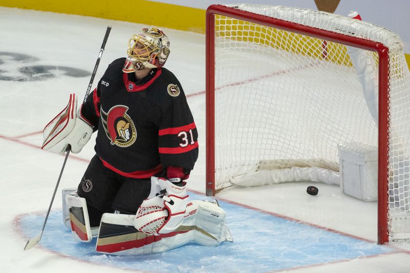 Nov 4, 2023; Ottawa, Ontario, CAN; Ottawa Senators goalie Anton Forsberg (31) reacts to a goal scored by Tampa Bay Lightning center Brayden Point (21-not pictured) in the third period at the Canadian Tire Centre. Mandatory Credit: Marc DesRosiers-USA TODAY Sports