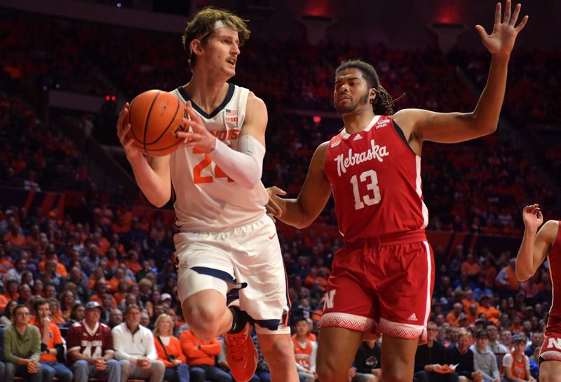 Jan 31, 2023; Champaign, Illinois, USA; Illinois Fighting Illini forward Matthew Mayer (24) drives the ball past Nebraska Cornhuskers forward Derrick Walker (13) during the first half at State Farm Center. Mandatory Credit: Ron Johnson-USA TODAY Sports