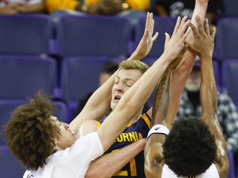 Jan 14, 2023; Seattle, Washington, USA; California Golden Bears forward Lars Thiemann (21) passes out of a double team by Washington Huskies center Braxton Meah (34) and forward Keion Brooks (1) during the first half at Alaska Airlines Arena at Hec Edmundson Pavilion. Mandatory Credit: Joe Nicholson-USA TODAY Sports