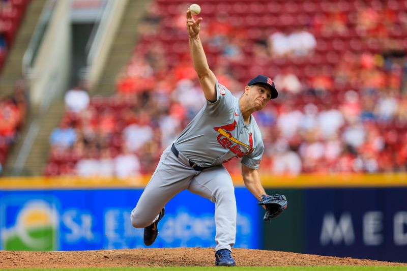 May 29, 2024; Cincinnati, Ohio, USA; St. Louis Cardinals relief pitcher Ryan Helsley (56) pitches against the Cincinnati Reds in the ninth inning at Great American Ball Park. Mandatory Credit: Katie Stratman-USA TODAY Sports