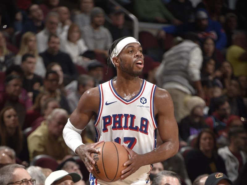 CLEVELAND, OH - FEBRUARY 12: Buddy Heild #17 of the Philadelphia 76ers looks to pass the ball during the game against the Cleveland Cavaliers on February 12, 2024 at Rocket Mortgage FieldHouse in Cleveland, Ohio. NOTE TO USER: User expressly acknowledges and agrees that, by downloading and/or using this Photograph, user is consenting to the terms and conditions of the Getty Images License Agreement. Mandatory Copyright Notice: Copyright 2024 NBAE (Photo by David Liam Kyle/NBAE via Getty Images)