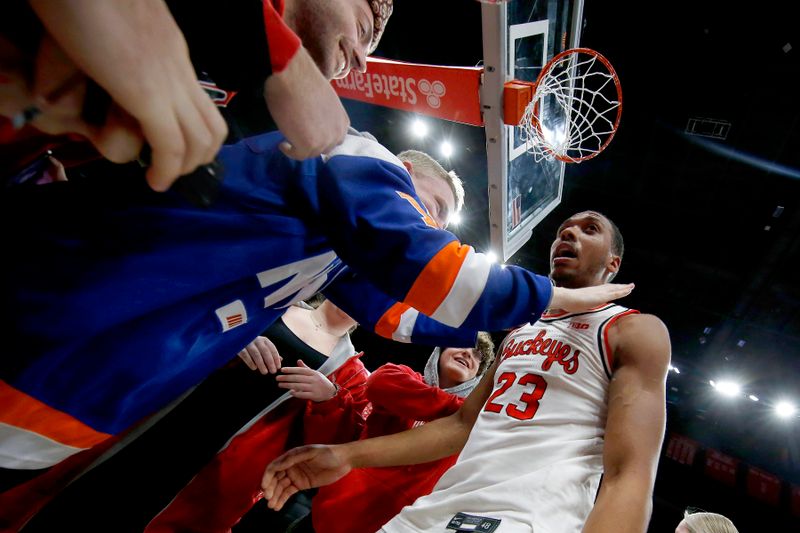 Feb 18, 2024; Columbus, Ohio, USA;  Ohio State Buckeyes forward Zed Key (23) celebrates with fans after the game against the Purdue Boilermakers at Value City Arena. Mandatory Credit: Joseph Maiorana-USA TODAY Sports