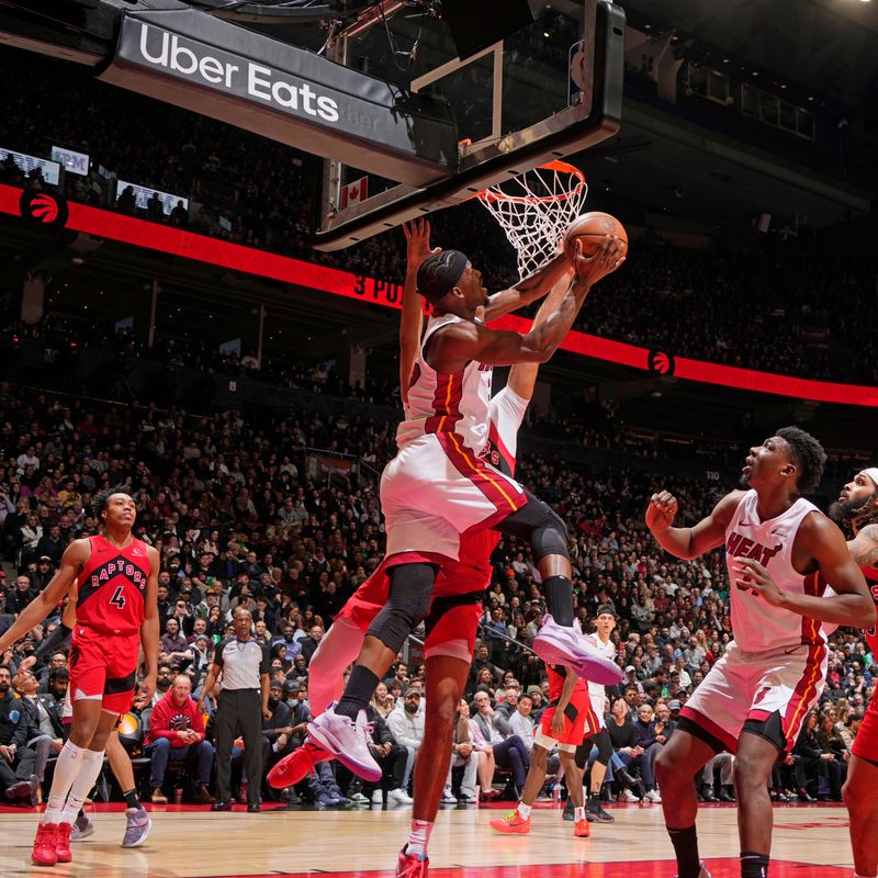 TORONTO, CANADA - JANUARY 17: Jimmy Butler #22 of the Miami Heat drives to the basket during the game against the Toronto Raptors on January 17, 2024 at the Scotiabank Arena in Toronto, Ontario, Canada.  NOTE TO USER: User expressly acknowledges and agrees that, by downloading and or using this Photograph, user is consenting to the terms and conditions of the Getty Images License Agreement.  Mandatory Copyright Notice: Copyright 2024 NBAE (Photo by Mark Blinch/NBAE via Getty Images)