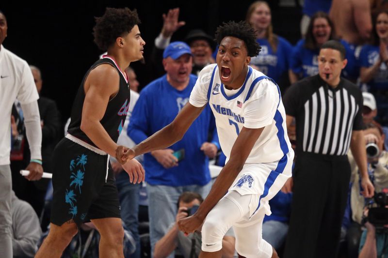 Feb 25, 2024; Memphis, Tennessee, USA; Memphis Tigers forward Nae'Qwan Tomlin (7) reacts after a dunk during the second half against the Florida Atlantic Owls at FedExForum. Mandatory Credit: Petre Thomas-USA TODAY Sports