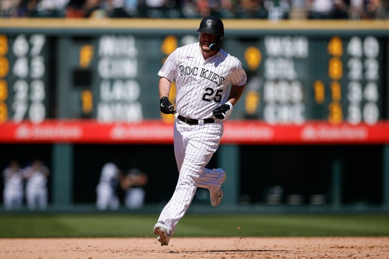 Jul 16, 2023; Denver, Colorado, USA; Colorado Rockies designated hitter C.J. Cron (25) rounds the bases on a grand slam in the eighth inning against the New York Yankees at Coors Field. Mandatory Credit: Isaiah J. Downing-USA TODAY Sports