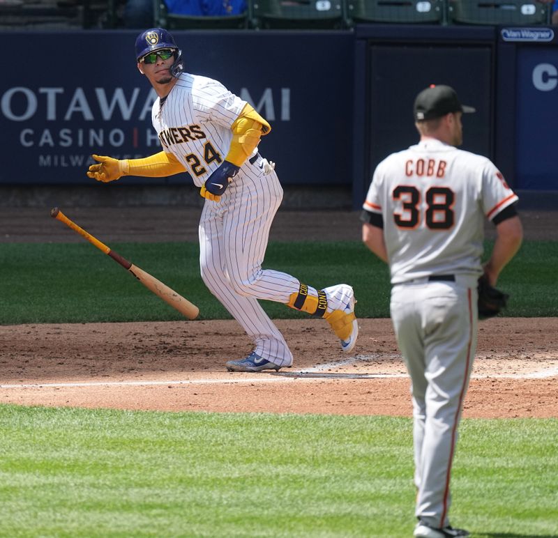 May 28, 2023; Milwaukee, Wisconsin, USA; Milwaukee Brewers catcher William Contreras (24) hits a two-run home run off San Francisco Giants starting pitcher Alex Cobb (38) during the second inning at American Family Field. Mandatory Credit: Mark Hoffman/Milwaukee Journal Sentinel-USA TODAY Sports