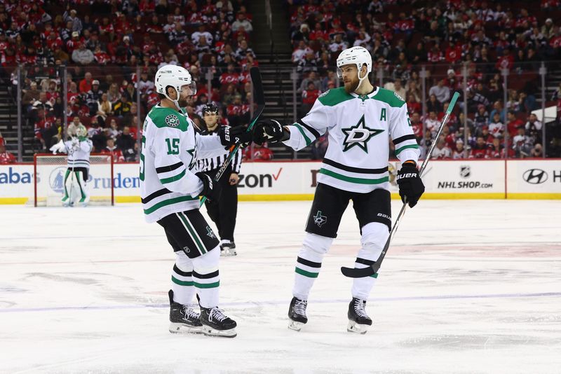 Jan 20, 2024; Newark, New Jersey, USA; Dallas Stars center Craig Smith (15) celebrates his goal against the New Jersey Devils during the third period at Prudential Center. Mandatory Credit: Ed Mulholland-USA TODAY Sports